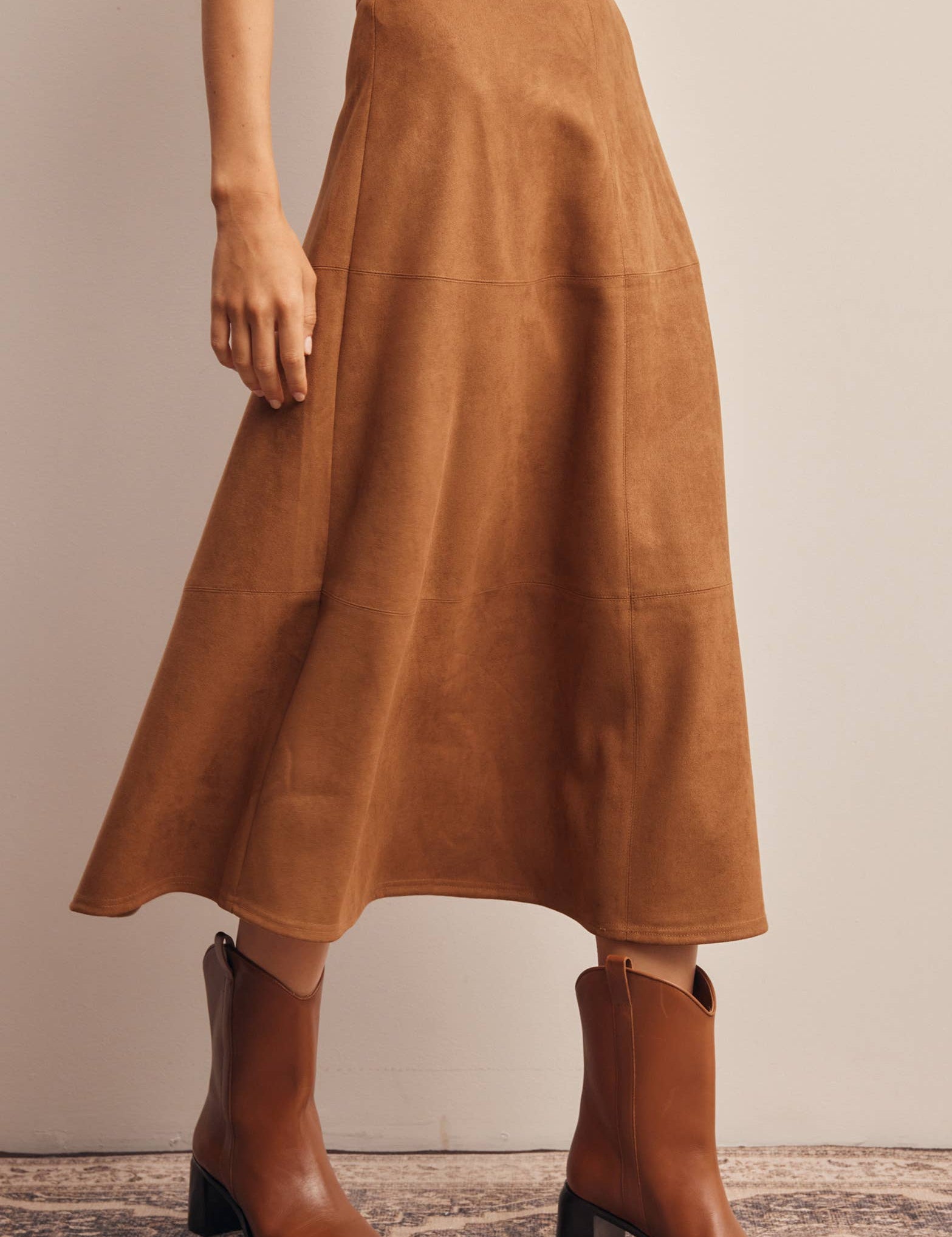 faux suede midi skirt, brown suede skirt, camel midi skirt, women’s a-line midi skirt, high waisted suede skirt, stretch suede skirt, fall midi skirt, western midi skirt, brown fall skirt, thanksgiving outfit skirt, women’s boutique skirt, fall skirt with boots