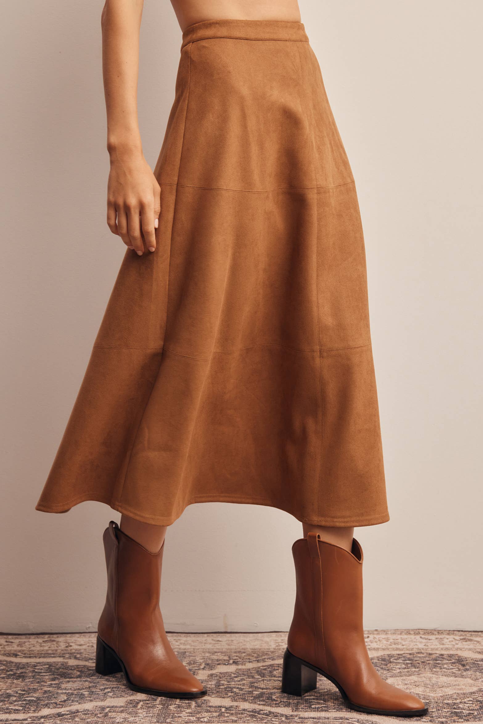 faux suede midi skirt, brown suede skirt, camel midi skirt, women’s a-line midi skirt, high waisted suede skirt, stretch suede skirt, fall midi skirt, western midi skirt, brown fall skirt, thanksgiving outfit skirt, women’s boutique skirt, fall skirt with boots