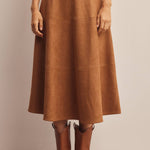 faux suede midi skirt, brown suede skirt, camel midi skirt, women’s a-line midi skirt, high waisted suede skirt, stretch suede skirt, fall midi skirt, western midi skirt, brown fall skirt, thanksgiving outfit skirt, women’s boutique skirt, fall skirt with boots