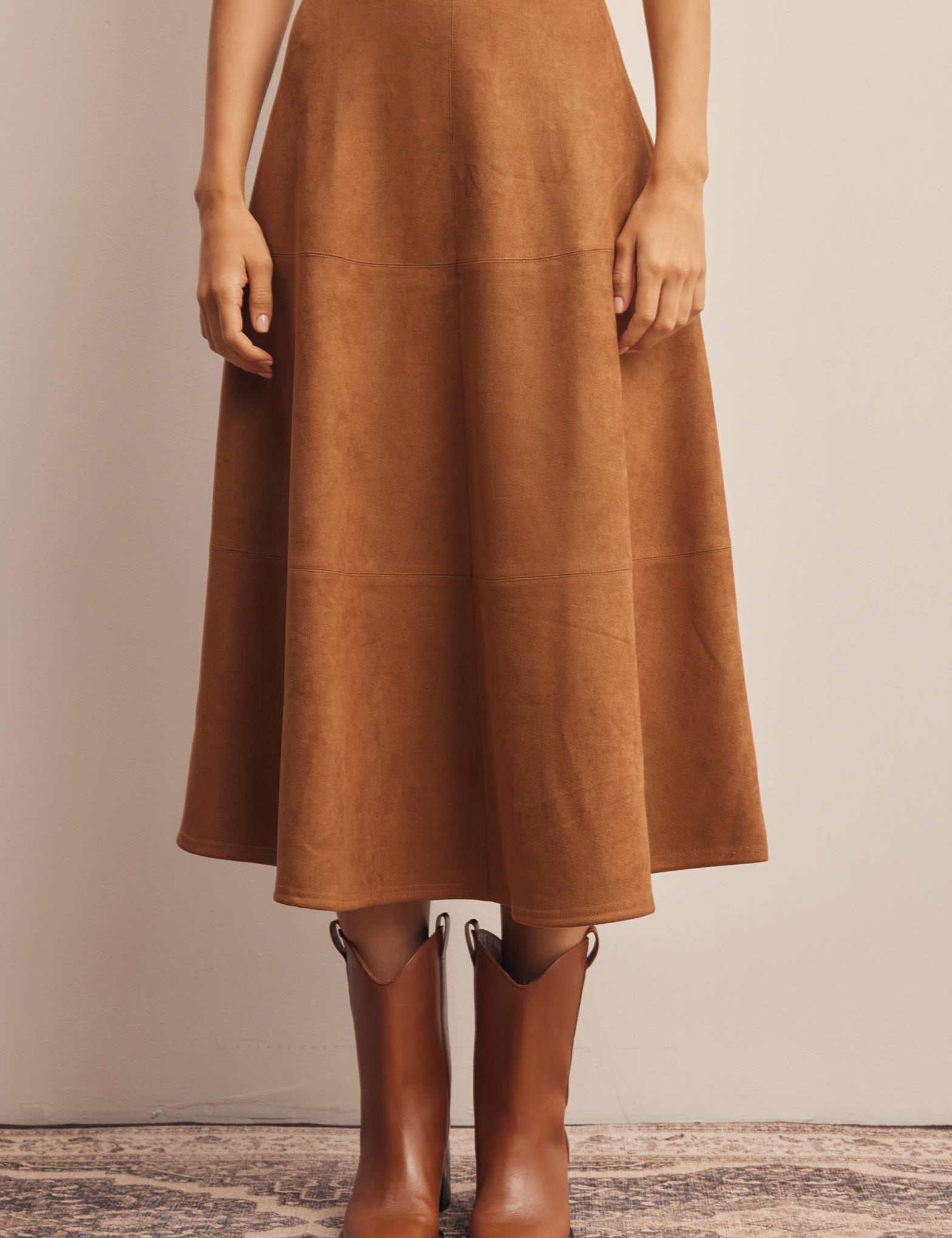 faux suede midi skirt, brown suede skirt, camel midi skirt, women’s a-line midi skirt, high waisted suede skirt, stretch suede skirt, fall midi skirt, western midi skirt, brown fall skirt, thanksgiving outfit skirt, women’s boutique skirt, fall skirt with boots