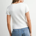 white ribbed knit top
button front ribbed top
fitted white short sleeve top
ribbed cardigan top
white summer knit top
casual summer outfit
feminine everyday top
white button front sweater top
classic americana style
stretch ribbed shirt
versatile summer staple
fitted knit tee
boutique basics
elevated casual clothing
women's ribbed button top
summer layering piece
white short sleeve cardigan
flattering ribbed knit top
everyday wardrobe essential
soft stretch knit top