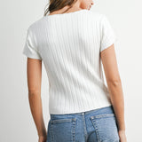 white ribbed knit top
button front ribbed top
fitted white short sleeve top
ribbed cardigan top
white summer knit top
casual summer outfit
feminine everyday top
white button front sweater top
classic americana style
stretch ribbed shirt
versatile summer staple
fitted knit tee
boutique basics
elevated casual clothing
women's ribbed button top
summer layering piece
white short sleeve cardigan
flattering ribbed knit top
everyday wardrobe essential
soft stretch knit top