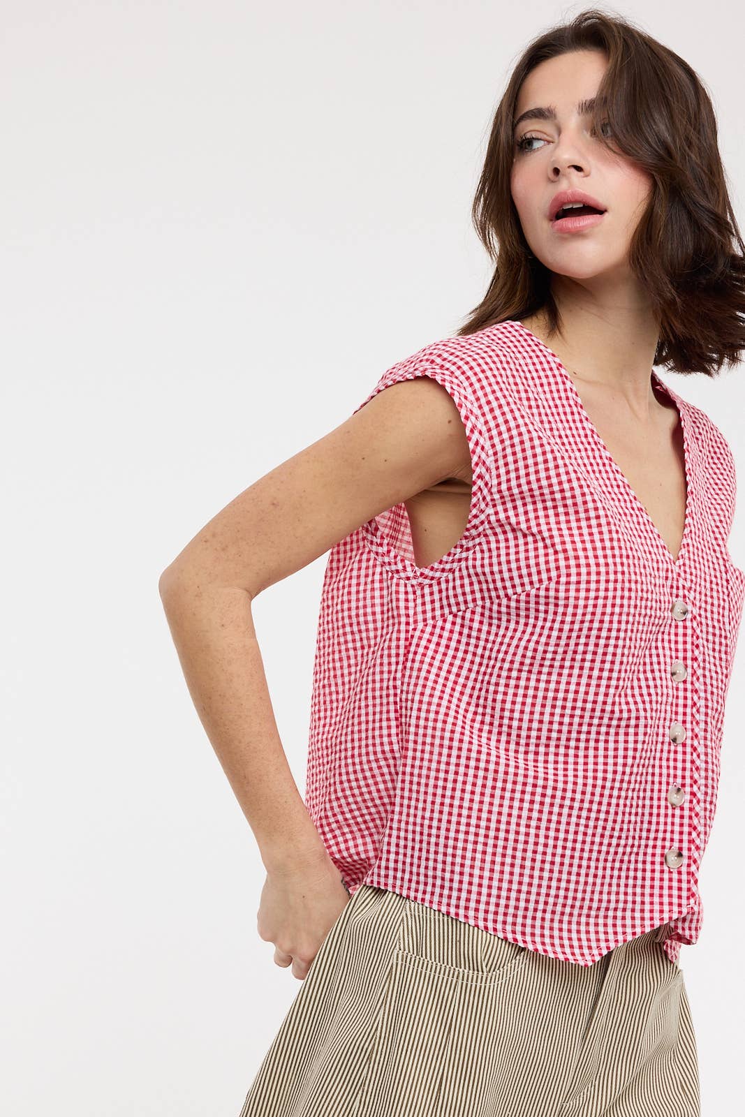 red gingham top
gingham button front blouse
red and white checkered top
sleeveless gingham shirt
boxy fit summer top
picnic outfit top
americana summer clothing
red gingham blouse
casual summer button front top
county fair outfit
lightweight summer blouse
relaxed fit gingham top
classic gingham shirt women
boutique summer clothing
red checkered blouse
summer picnic outfit
casual sleeveless blouse
southern summer style
vintage inspired gingham top
women's button front top