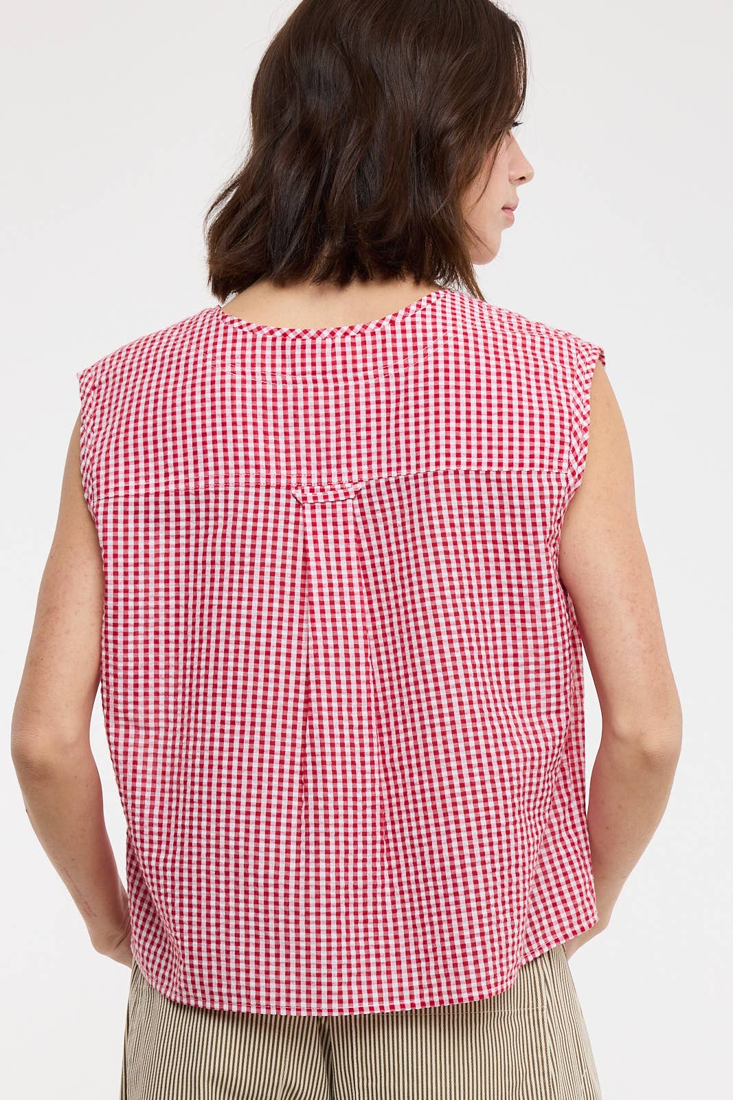 red gingham top
gingham button front blouse
red and white checkered top
sleeveless gingham shirt
boxy fit summer top
picnic outfit top
americana summer clothing
red gingham blouse
casual summer button front top
county fair outfit
lightweight summer blouse
relaxed fit gingham top
classic gingham shirt women
boutique summer clothing
red checkered blouse
summer picnic outfit
casual sleeveless blouse
southern summer style
vintage inspired gingham top
women's button front top