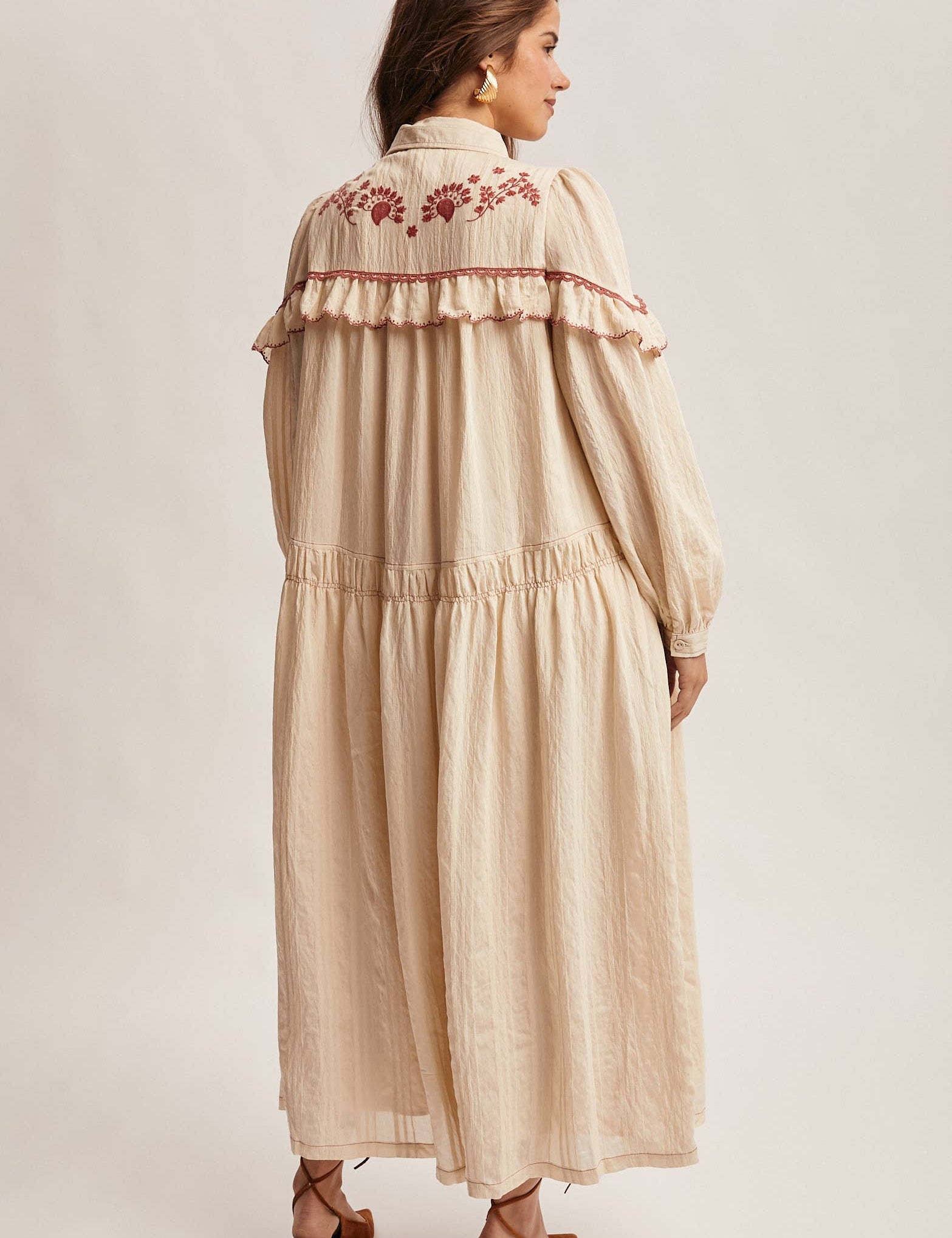 cream embroidered maxi dress, floral embroidered maxi dress, fall maxi dress, western embroidered dress, cream long sleeve dress, ruffle maxi dress, button front maxi dress, boho maxi dress, fall family photo dress, holiday gathering dress, embroidered fall dress, women’s boutique maxi dress, maternity dress