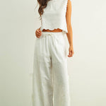 white embroidered cotton linen wide leg pants
relaxed fit embroidered pants with side tie details
lightweight cotton linen pants with wide leg silhouette
white summer pants with embroidery accents
breathable cotton linen trousers for women
matching set embroidered wide leg pants
neutral resort wear pants with side tie detail
elevated white linen blend pants for summer
honeymoon outfit
bachelorette outfit
bridal outfit