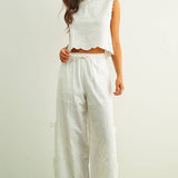 white embroidered cotton linen wide leg pants
relaxed fit embroidered pants with side tie details
lightweight cotton linen pants with wide leg silhouette
white summer pants with embroidery accents
breathable cotton linen trousers for women
matching set embroidered wide leg pants
neutral resort wear pants with side tie detail
elevated white linen blend pants for summer
honeymoon outfit
bachelorette outfit
bridal outfit