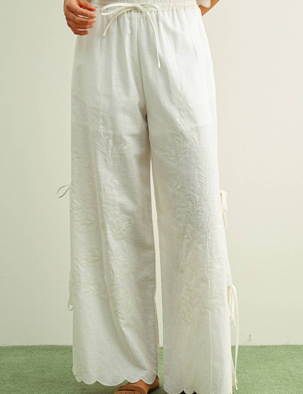 white embroidered cotton linen wide leg pants
relaxed fit embroidered pants with side tie details
lightweight cotton linen pants with wide leg silhouette
white summer pants with embroidery accents
breathable cotton linen trousers for women
matching set embroidered wide leg pants
neutral resort wear pants with side tie detail
elevated white linen blend pants for summer
honeymoon outfit
bachelorette outfit
bridal outfit