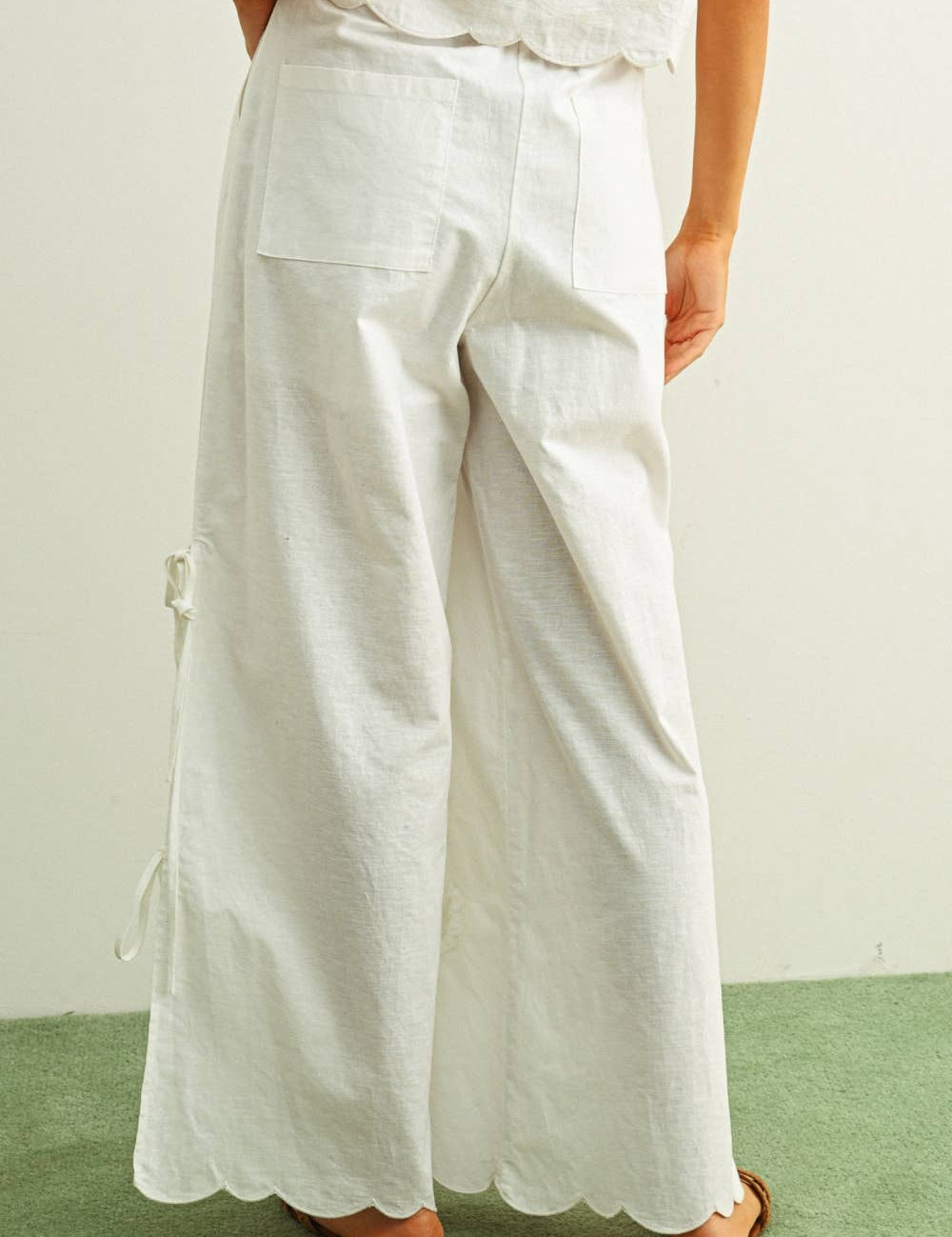 white embroidered cotton linen wide leg pants
relaxed fit embroidered pants with side tie details
lightweight cotton linen pants with wide leg silhouette
white summer pants with embroidery accents
breathable cotton linen trousers for women
matching set embroidered wide leg pants
neutral resort wear pants with side tie detail
elevated white linen blend pants for summer
honeymoon outfit
bachelorette outfit
bridal outfit