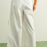 white embroidered cotton linen wide leg pants
relaxed fit embroidered pants with side tie details
lightweight cotton linen pants with wide leg silhouette
white summer pants with embroidery accents
breathable cotton linen trousers for women
matching set embroidered wide leg pants
neutral resort wear pants with side tie detail
elevated white linen blend pants for summer
honeymoon outfit
bachelorette outfit
bridal outfit
