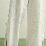 white embroidered cotton linen wide leg pants
relaxed fit embroidered pants with side tie details
lightweight cotton linen pants with wide leg silhouette
white summer pants with embroidery accents
breathable cotton linen trousers for women
matching set embroidered wide leg pants
neutral resort wear pants with side tie detail
elevated white linen blend pants for summer
honeymoon outfit
bachelorette outfit
bridal outfit