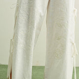 white embroidered cotton linen wide leg pants
relaxed fit embroidered pants with side tie details
lightweight cotton linen pants with wide leg silhouette
white summer pants with embroidery accents
breathable cotton linen trousers for women
matching set embroidered wide leg pants
neutral resort wear pants with side tie detail
elevated white linen blend pants for summer
honeymoon outfit
bachelorette outfit
bridal outfit
