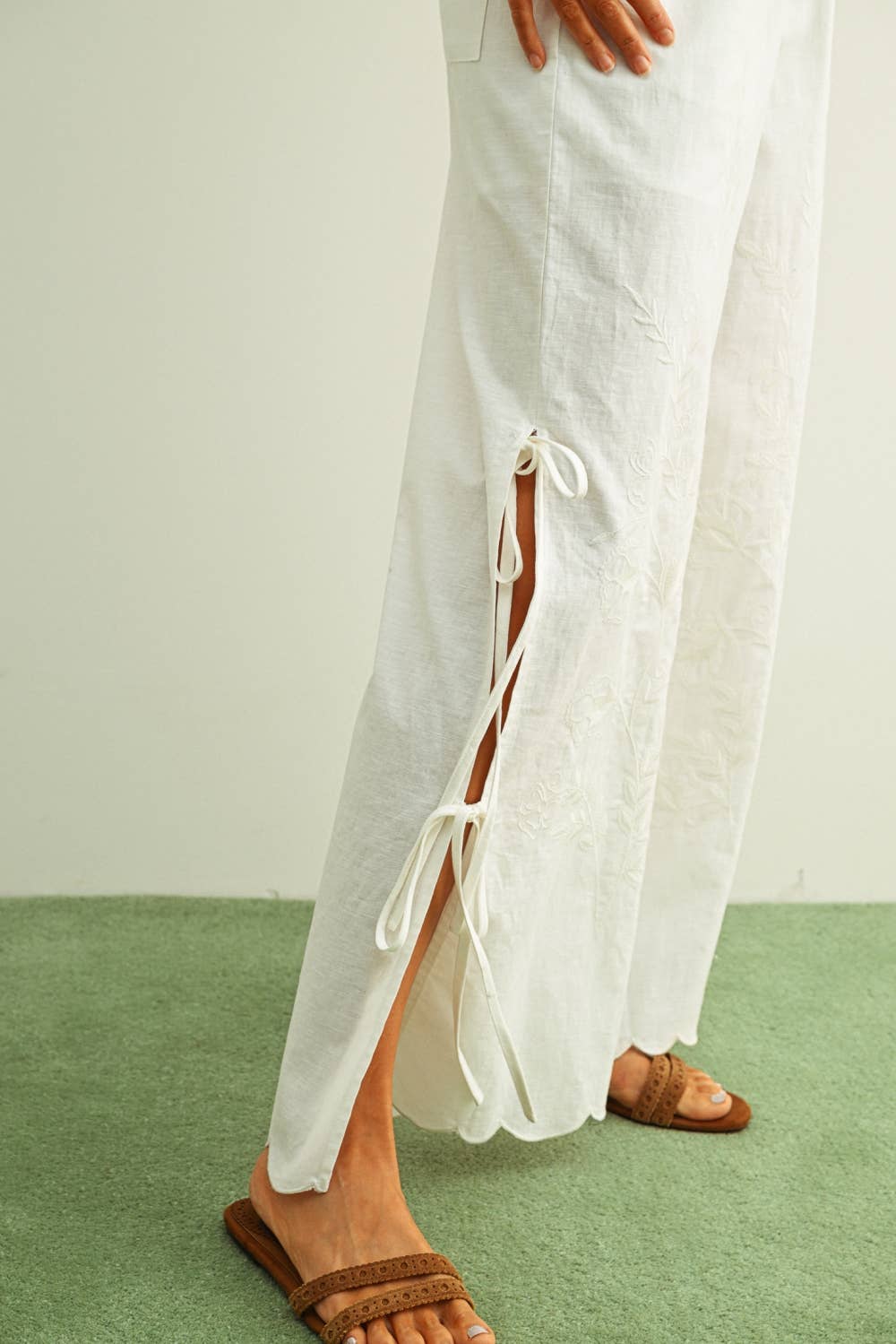 white embroidered cotton linen wide leg pants
relaxed fit embroidered pants with side tie details
lightweight cotton linen pants with wide leg silhouette
white summer pants with embroidery accents
breathable cotton linen trousers for women
matching set embroidered wide leg pants
neutral resort wear pants with side tie detail
elevated white linen blend pants for summer
honeymoon outfit
bachelorette outfit
bridal outfit