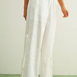 white embroidered cotton linen wide leg pants
relaxed fit embroidered pants with side tie details
lightweight cotton linen pants with wide leg silhouette
white summer pants with embroidery accents
breathable cotton linen trousers for women
matching set embroidered wide leg pants
neutral resort wear pants with side tie detail
elevated white linen blend pants for summer
honeymoon outfit
bachelorette outfit
bridal outfit