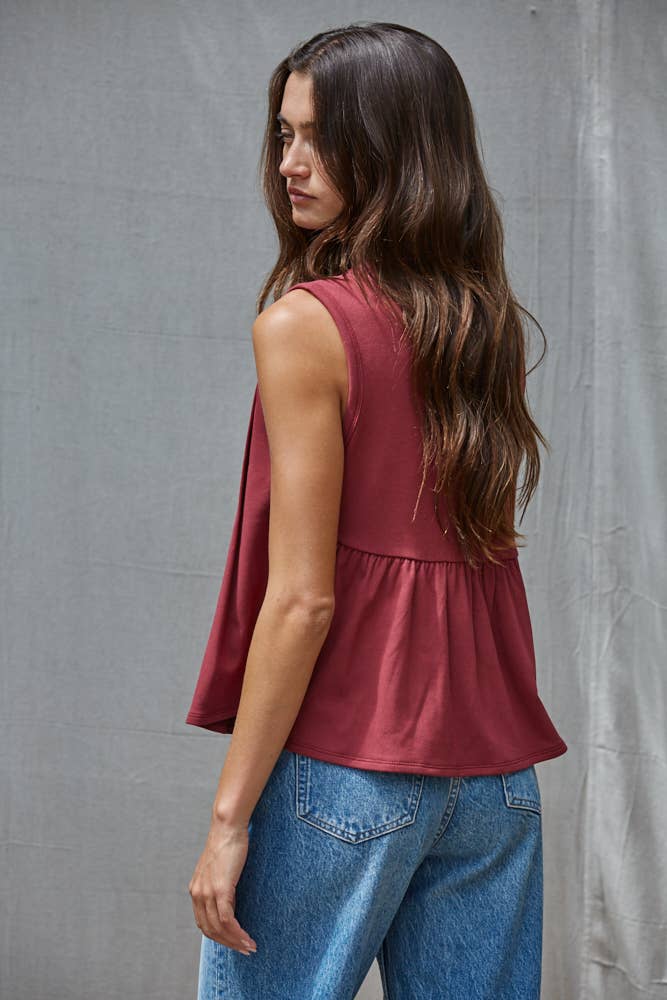 rust red sleeveless rayon blend tank top with front pleats, crew neckline and relaxed gathered silhouette