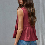rust red sleeveless rayon blend tank top with front pleats, crew neckline and relaxed gathered silhouette