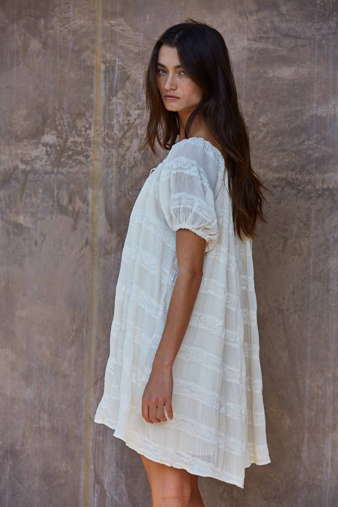 white oversized mini dress
flowy vacation dress women
off shoulder summer mini dress
lace detail oversized dress
beach coverup style mini dress
resort wear white dress women
airy summer vacation dress
relaxed fit white mini dress
italian summer inspired dress
summer spritz collection dress
bachelorette party dress
bridal casual dress
little white dress