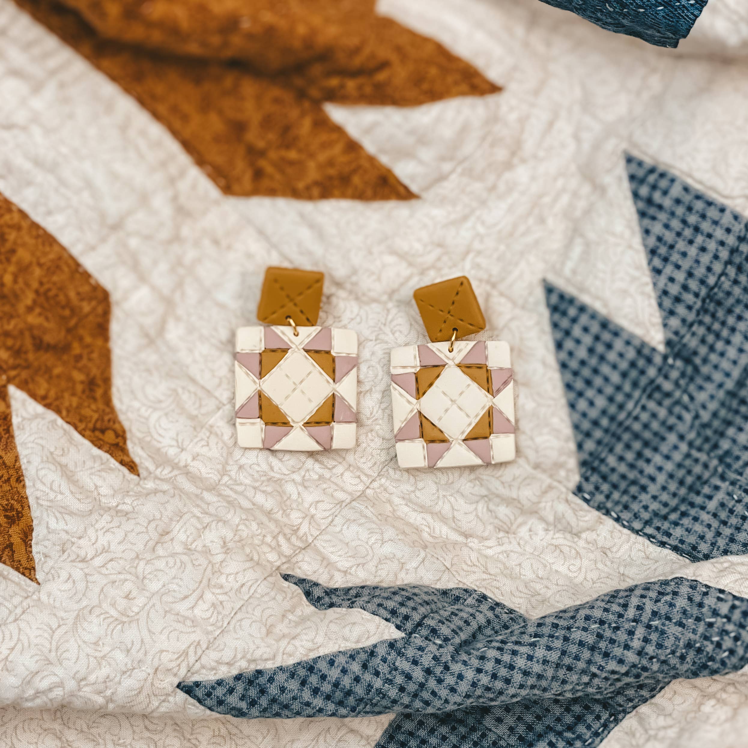 handmade quilt earrings, patchwork dangle earrings, polymer clay dangle earrings, quilt square earrings, colorful geometric earrings, artisan clay earrings, lightweight statement earrings, handcrafted polymer clay jewelry, handmade Michigan earrings, nickel free dangle earrings