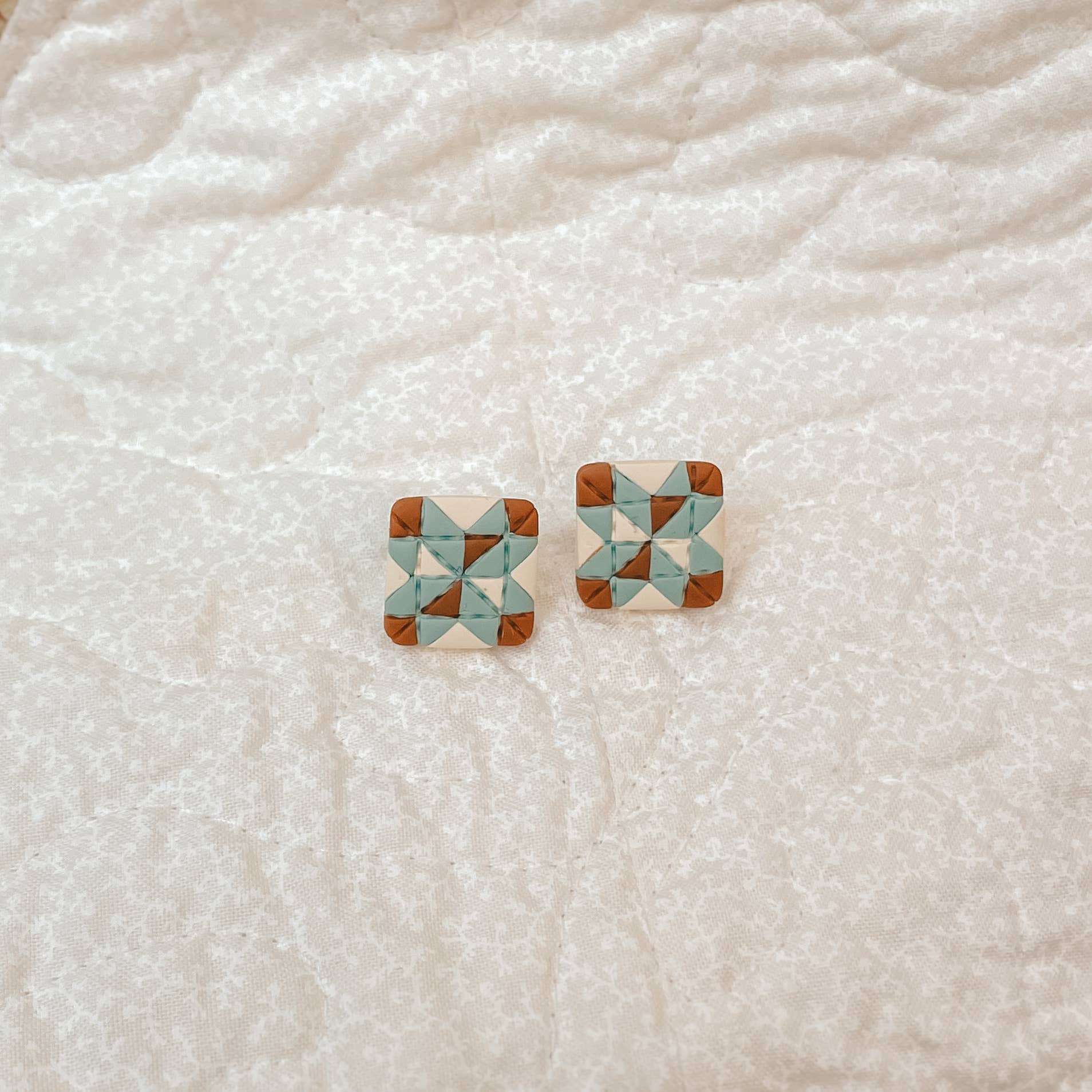 patchwork quilt stud earrings, quilt square earrings, handmade polymer clay earrings, artisan clay stud earrings, lightweight quilt earrings, handcrafted earrings Michigan, colorful patchwork jewelry, nickel free stud earrings, folk art earrings, handmade quilt inspired jewelry