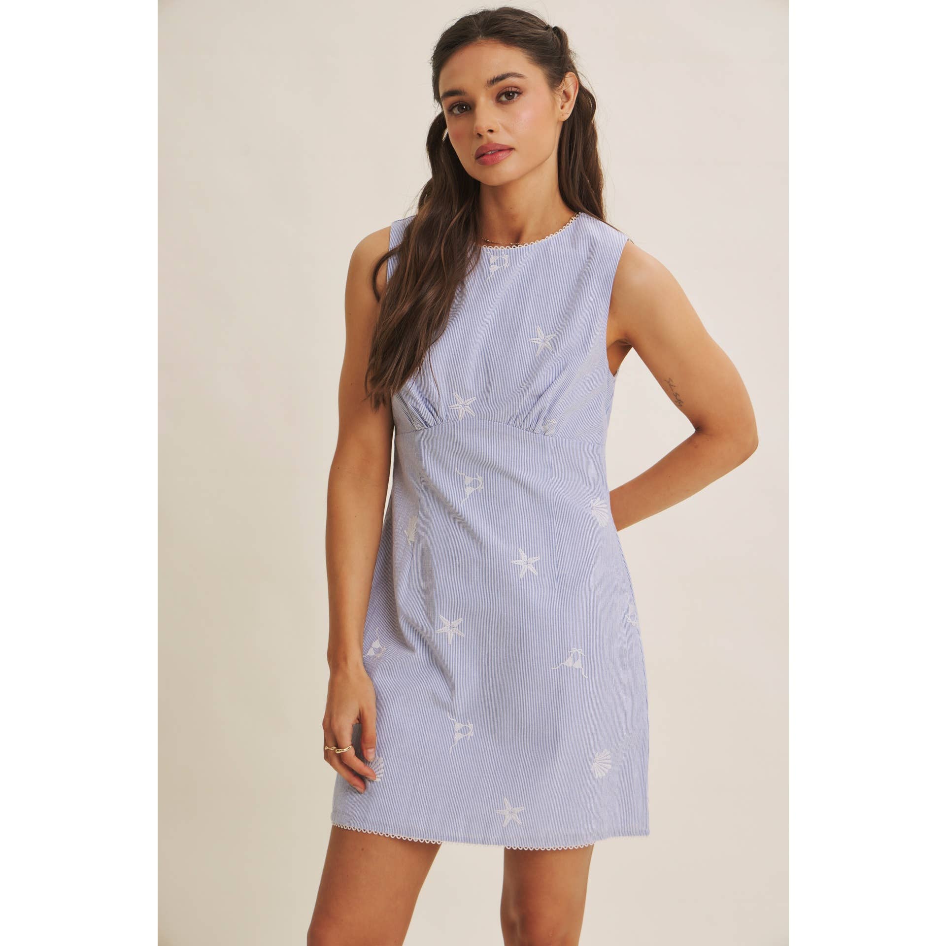 blue striped embroidered mini dress
coastal embroidered summer dress
starfish embroidered mini dress
beach vacation dress women
sleeveless cotton blend mini dress
resort wear boutique dress
blue summer brunch dress
coastal chic mini dress
italian summer outfit women
west of may spritz collection