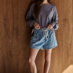 chambray shorts
pull on denim shorts
elastic waist shorts
drawstring denim shorts
lightweight summer shorts
relaxed fit shorts women
wide leg shorts
casual summer shorts
blue cotton shorts
vacation shorts women
lake day outfit
comfortable summer bottoms
pull on cotton shorts
relaxed denim look shorts
boutique summer shorts
everyday casual shorts
soft woven shorts
elastic waistband shorts
southern summer style
easy summer outfit