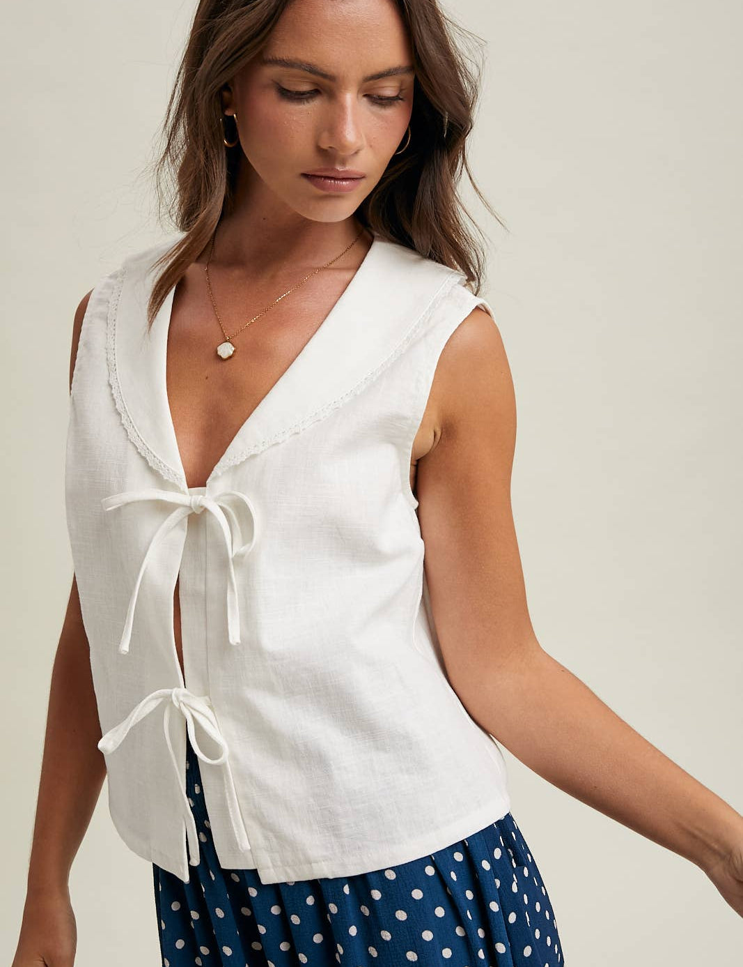 white linen tie front top women
sailor collar sleeveless blouse
linen blend summer top women
coastal white blouse women
feminine tie front summer top
lightweight linen tank women
outer banks inspired blouse
elevated casual summer top
white vacation top women
summer spritz collection top