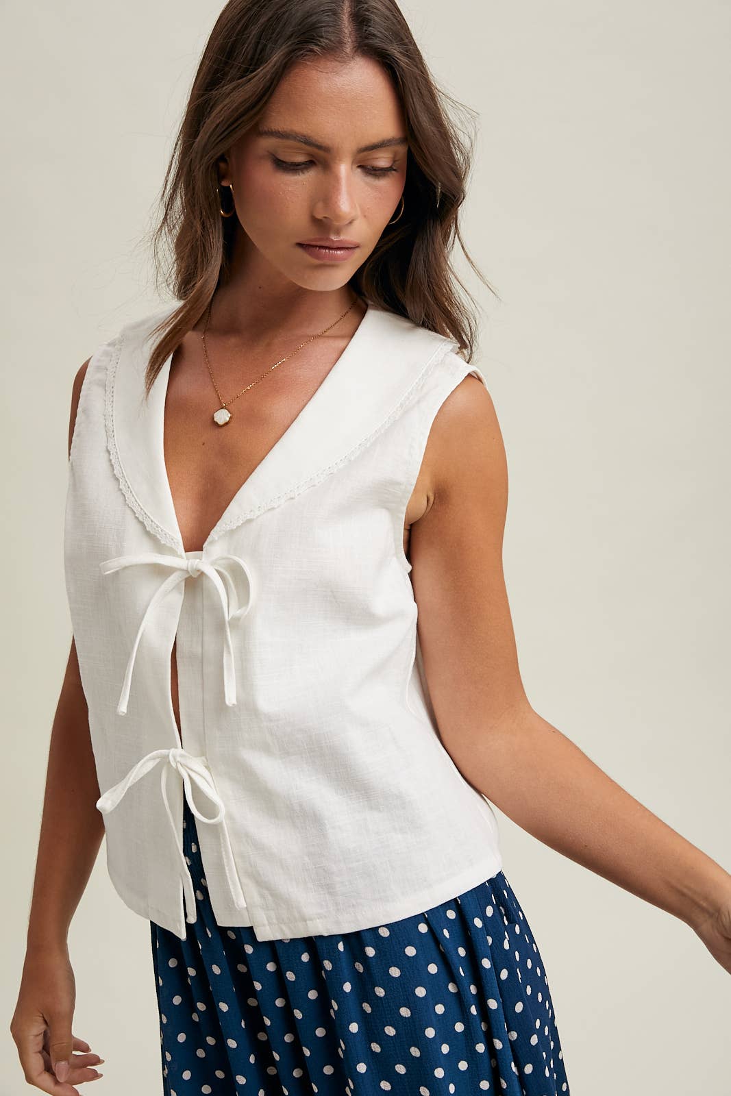 white linen tie front top women
sailor collar sleeveless blouse
linen blend summer top women
coastal white blouse women
feminine tie front summer top
lightweight linen tank women
outer banks inspired blouse
elevated casual summer top
white vacation top women
summer spritz collection top