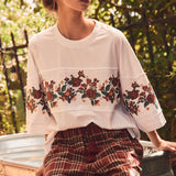 ivory oversized cotton tee with burgundy rust and green floral embroidery and wide short sleeves