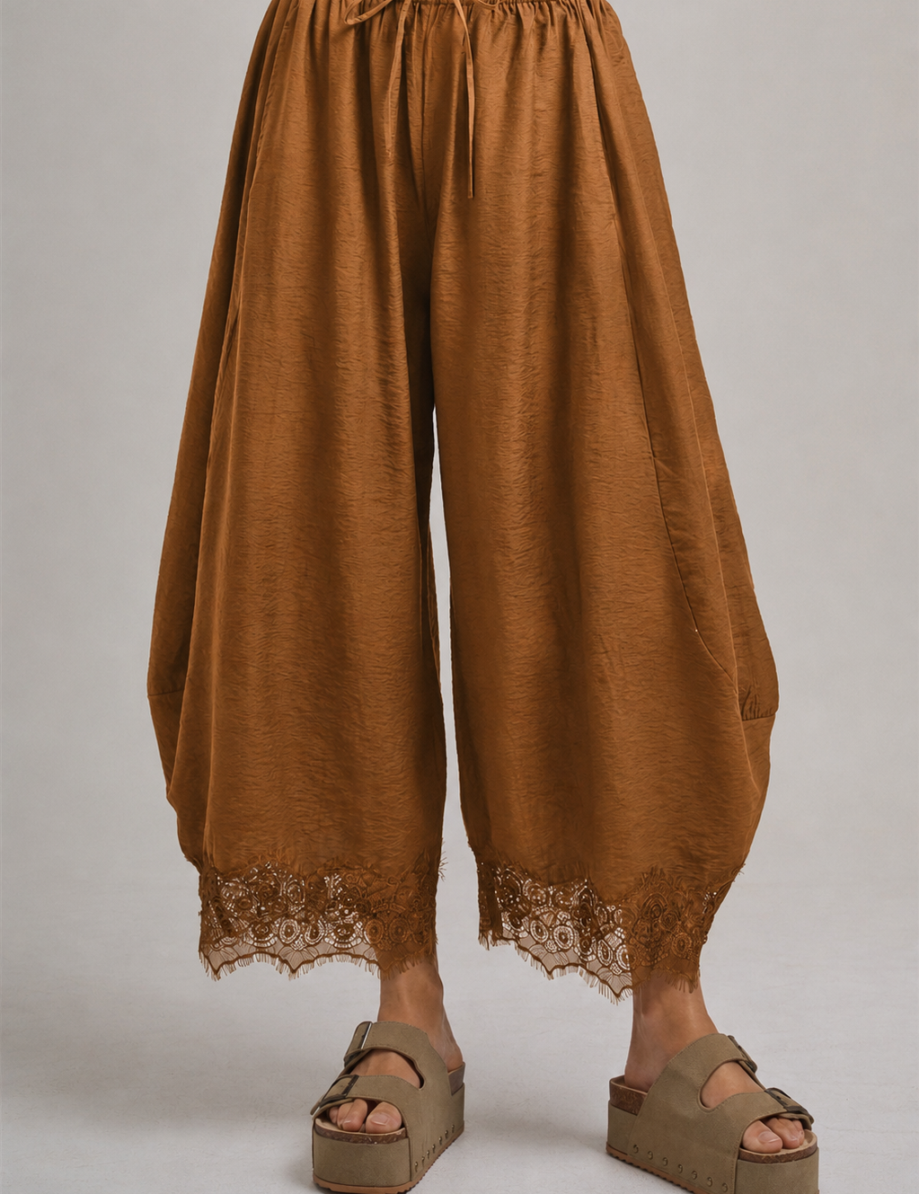 rust brown lightweight balloon leg pants with elastic drawstring waist and lace trimmed hem