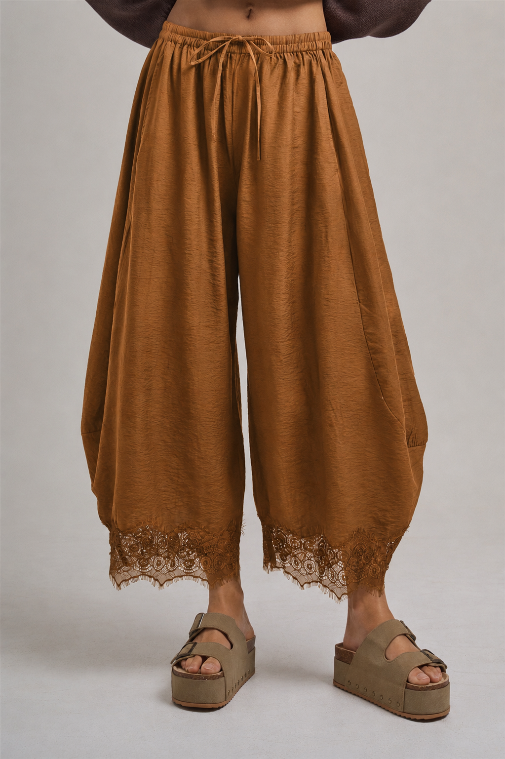 rust brown lightweight balloon leg pants with elastic drawstring waist and lace trimmed hem