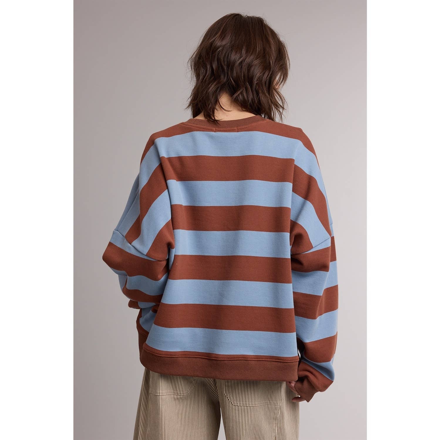 striped sweatshirt, oversized striped sweatshirt, retro striped pullover, blue and brown striped sweatshirt, women's crewneck sweatshirt, casual fall sweatshirt, collegiate style sweatshirt, cozy oversized pullover, women's boutique sweatshirt, west of may boutique