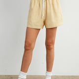 yellow striped drawstring shorts
coastal summer shorts women
lightweight vacation shorts
relaxed striped lounge shorts
elastic waist casual shorts women
resort wear boutique shorts
beach vacation outfit women
casual coastal style shorts
summer drawstring shorts women
west of may spritz collection