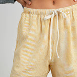 yellow striped drawstring shorts
coastal summer shorts women
lightweight vacation shorts
relaxed striped lounge shorts
elastic waist casual shorts women
resort wear boutique shorts
beach vacation outfit women
casual coastal style shorts
summer drawstring shorts women
west of may spritz collection
