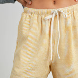 yellow striped drawstring shorts
coastal summer shorts women
lightweight vacation shorts
relaxed striped lounge shorts
elastic waist casual shorts women
resort wear boutique shorts
beach vacation outfit women
casual coastal style shorts
summer drawstring shorts women
west of may spritz collection
