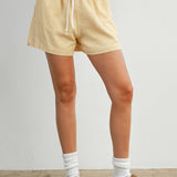 yellow striped drawstring shorts
coastal summer shorts women
lightweight vacation shorts
relaxed striped lounge shorts
elastic waist casual shorts women
resort wear boutique shorts
beach vacation outfit women
casual coastal style shorts
summer drawstring shorts women
west of may spritz collection
