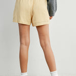 yellow striped drawstring shorts
coastal summer shorts women
lightweight vacation shorts
relaxed striped lounge shorts
elastic waist casual shorts women
resort wear boutique shorts
beach vacation outfit women
casual coastal style shorts
summer drawstring shorts women
west of may spritz collection