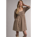 women's brown gingham dress, brown gingham mini dress, gingham babydoll dress, women's fall mini dress, square neck mini dress, smocked bodice dress, puff sleeve gingham dress, brown plaid dress, western fall dress, cowgirl mini dress, fall dress with boots, women's casual fall dress, cotton gingham dress, women's boutique fall clothing, western women's clothing, fall boutique dress, west of may