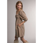 women's brown gingham dress, brown gingham mini dress, gingham babydoll dress, women's fall mini dress, square neck mini dress, smocked bodice dress, puff sleeve gingham dress, brown plaid dress, western fall dress, cowgirl mini dress, fall dress with boots, women's casual fall dress, cotton gingham dress, women's boutique fall clothing, western women's clothing, fall boutique dress, west of may