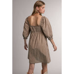 women's brown gingham dress, brown gingham mini dress, gingham babydoll dress, women's fall mini dress, square neck mini dress, smocked bodice dress, puff sleeve gingham dress, brown plaid dress, western fall dress, cowgirl mini dress, fall dress with boots, women's casual fall dress, cotton gingham dress, women's boutique fall clothing, western women's clothing, fall boutique dress, west of may