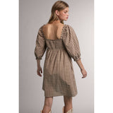 women's brown gingham dress, brown gingham mini dress, gingham babydoll dress, women's fall mini dress, square neck mini dress, smocked bodice dress, puff sleeve gingham dress, brown plaid dress, western fall dress, cowgirl mini dress, fall dress with boots, women's casual fall dress, cotton gingham dress, women's boutique fall clothing, western women's clothing, fall boutique dress, west of may