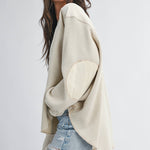 women's cream waffle knit thermal top with mixed fabric panels, long sleeves, drop shoulders, and oversized relaxed fit