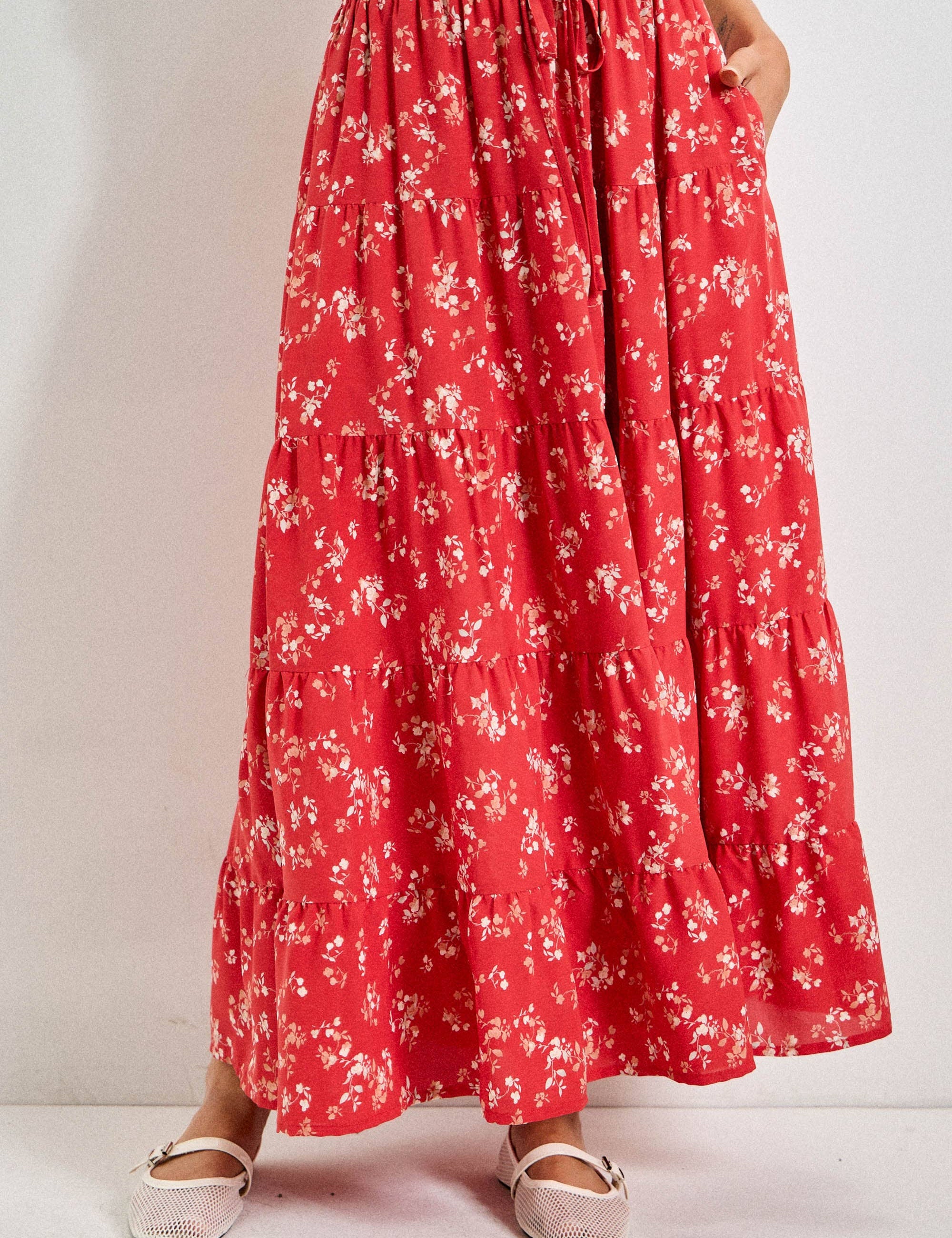 red floral tiered maxi skirt with pockets
lightweight floral maxi skirt with elastic waist
plus size summer skirt 
americana aesthetic
flowy red summer skirt with adjustable drawstring waist
tiered floral maxi skirt with lining
red floral boho skirt with pockets
feminine floral print maxi skirt for summer
relaxed fit tiered maxi skirt in red floral print
lightweight floral skirt with elastic waistband