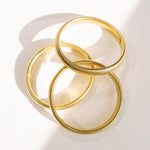 gold bangle bracelet
ribbed gold bangle
waterproof bracelet
tarnish resistant bracelet
stacking bangle bracelet
everyday gold bracelet
minimal gold bracelet
hypoallergenic bracelet
gold plated stainless steel bracelet
pool safe bracelet
beach safe jewelry
layering bracelet
mom friendly jewelry
west of may jewelry
béljoy bracelet