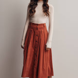 rust corduroy midi skirt, orange corduroy skirt, women’s button front skirt, a-line midi skirt, high waisted corduroy skirt, fall midi skirt, pleated midi skirt, women’s fall skirt, corduroy skirt with pockets, thanksgiving outfit skirt, western midi skirt, boutique fall skirt