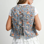 floral tie-front vest, cotton floral vest, women's floral vest, blue floral vest, tie-front vest, cottagecore vest, vintage inspired vest, layering vest, sleeveless floral top, fall layering piece, women's boutique vest, west of may boutique