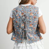 floral tie-front vest, cotton floral vest, women's floral vest, blue floral vest, tie-front vest, cottagecore vest, vintage inspired vest, layering vest, sleeveless floral top, fall layering piece, women's boutique vest, west of may boutique