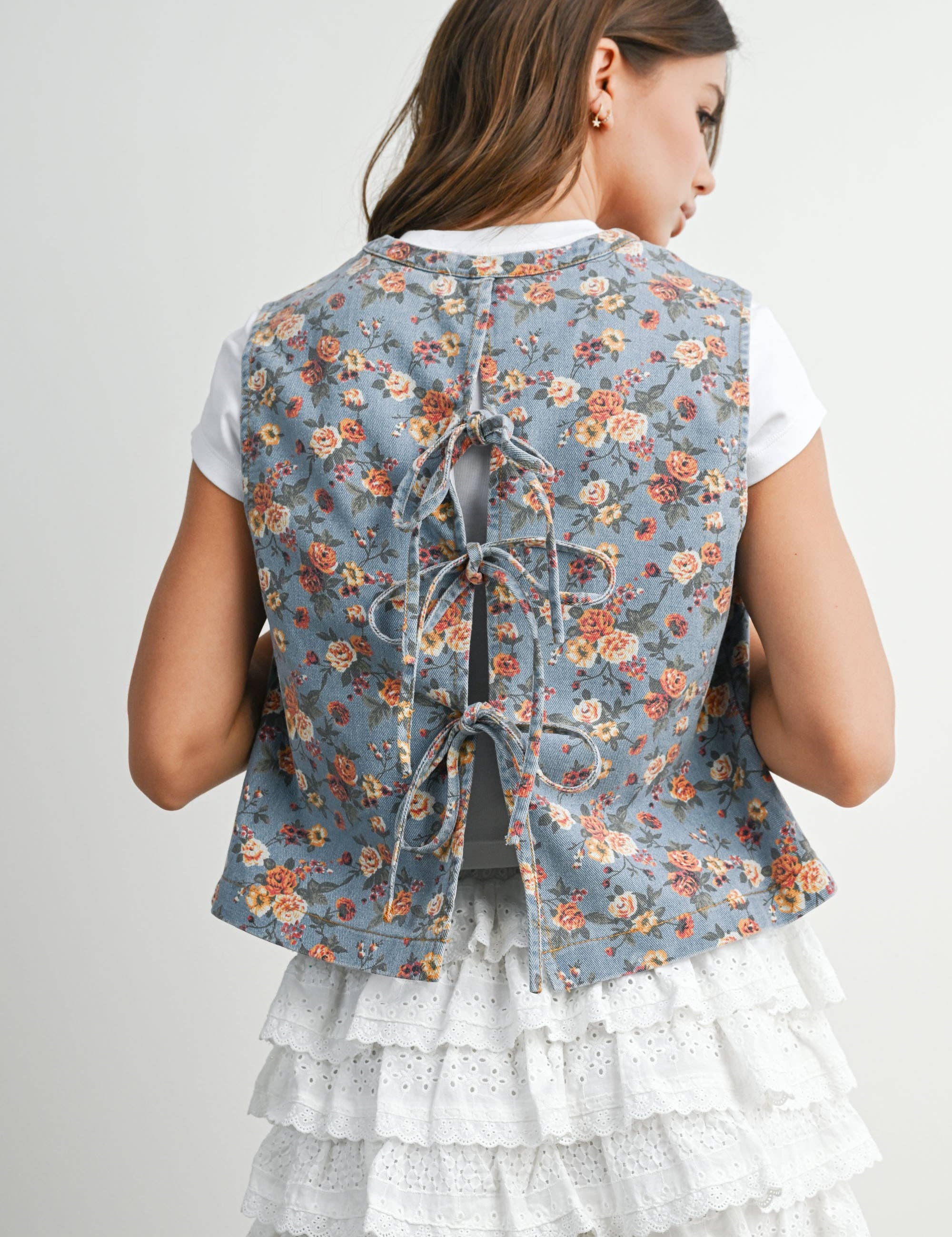 floral tie-front vest, cotton floral vest, women's floral vest, blue floral vest, tie-front vest, cottagecore vest, vintage inspired vest, layering vest, sleeveless floral top, fall layering piece, women's boutique vest, west of may boutique
