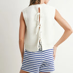 basic sleeveless sweater, white sleeveless sweater, white tie-back sweater, sweater vest, white sweater vest, simple top, basic top