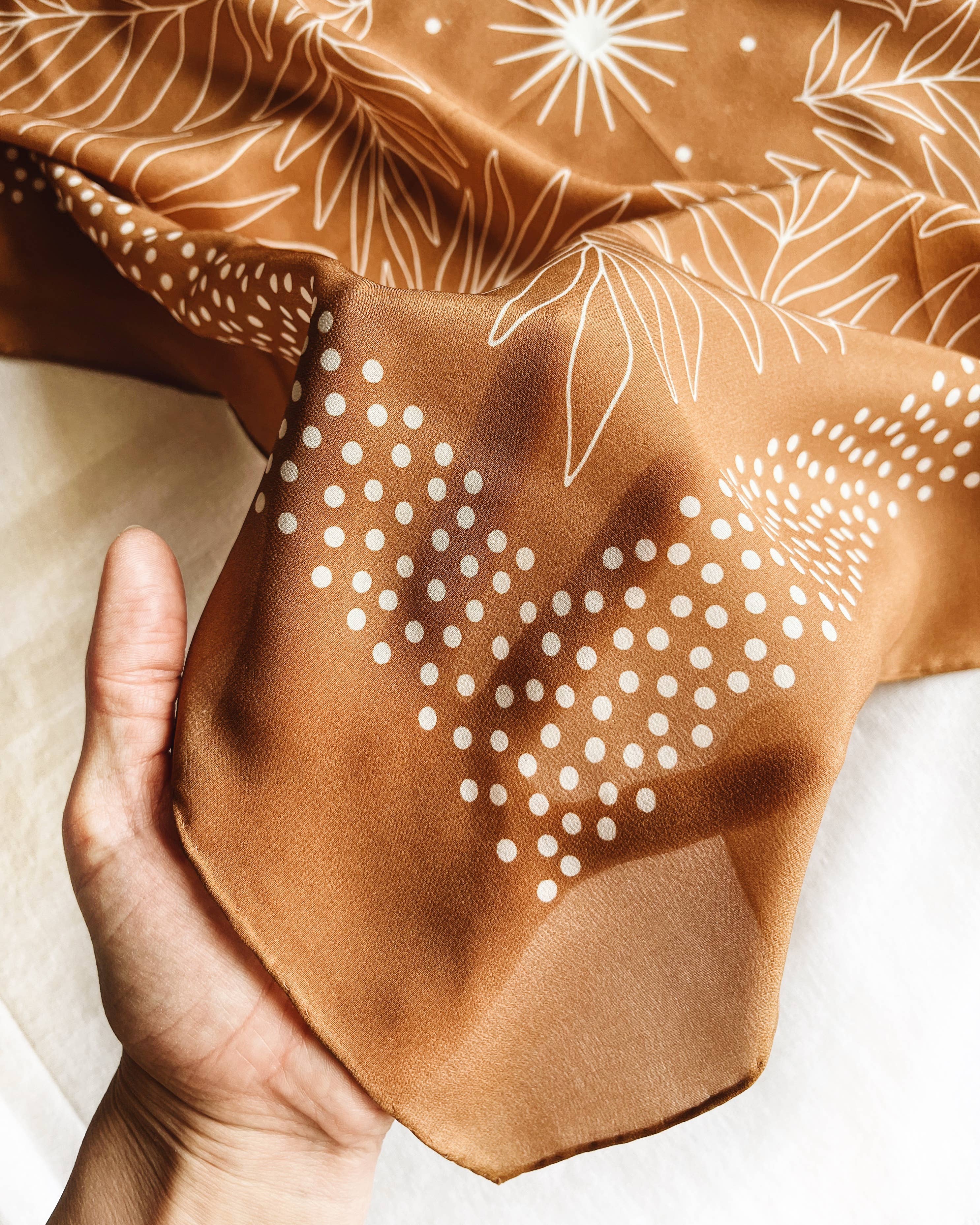 silk bandana, silk headscarf, silk scarf, silk hair scarf, hair scarf, western hair scarf, hair accessory, boho aesthetic, western aesthetic, outfit of the day, johnson city boutique, outfit idea, accessories, womens clothing, cool girl aesthetic, clean girl aesthetic, rust orange silk bandana