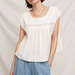 white embroidered blouse
embroidered summer top
white peasant blouse
lightweight rayon blouse
feminine summer top
casual white boutique top
embroidered detail shirt
relaxed fit white blouse
summer farmers market outfit
southern summer style
easy vacation outfit
white top with embroidery
flowy summer blouse
countryside summer fashion
casual feminine clothing
breathable warm weather top
white short sleeve blouse
classic summer wardrobe staple
boutique women's clothing
effortless everyday style